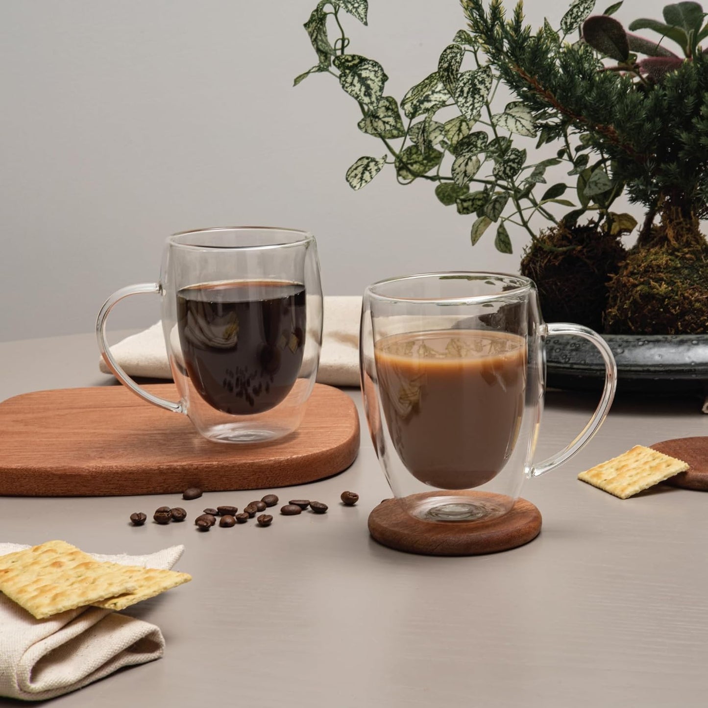 two glasses of coffee on a table