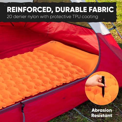 a red and white tent with an orange mattress with text: 'REINFORCED, DURABLE FABRIC 20 denier nylon with protective TPU coating Abrasion Resistant'