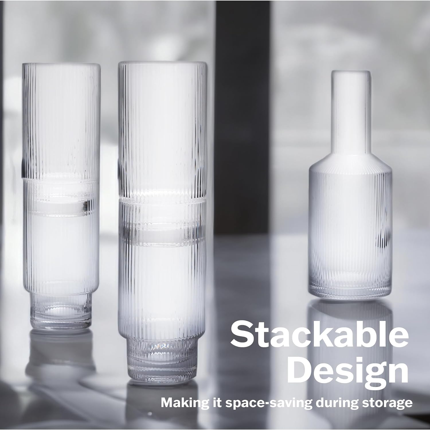 a group of clear glasses on a table with text: 'Stackable Design Making it space-saving during storage'