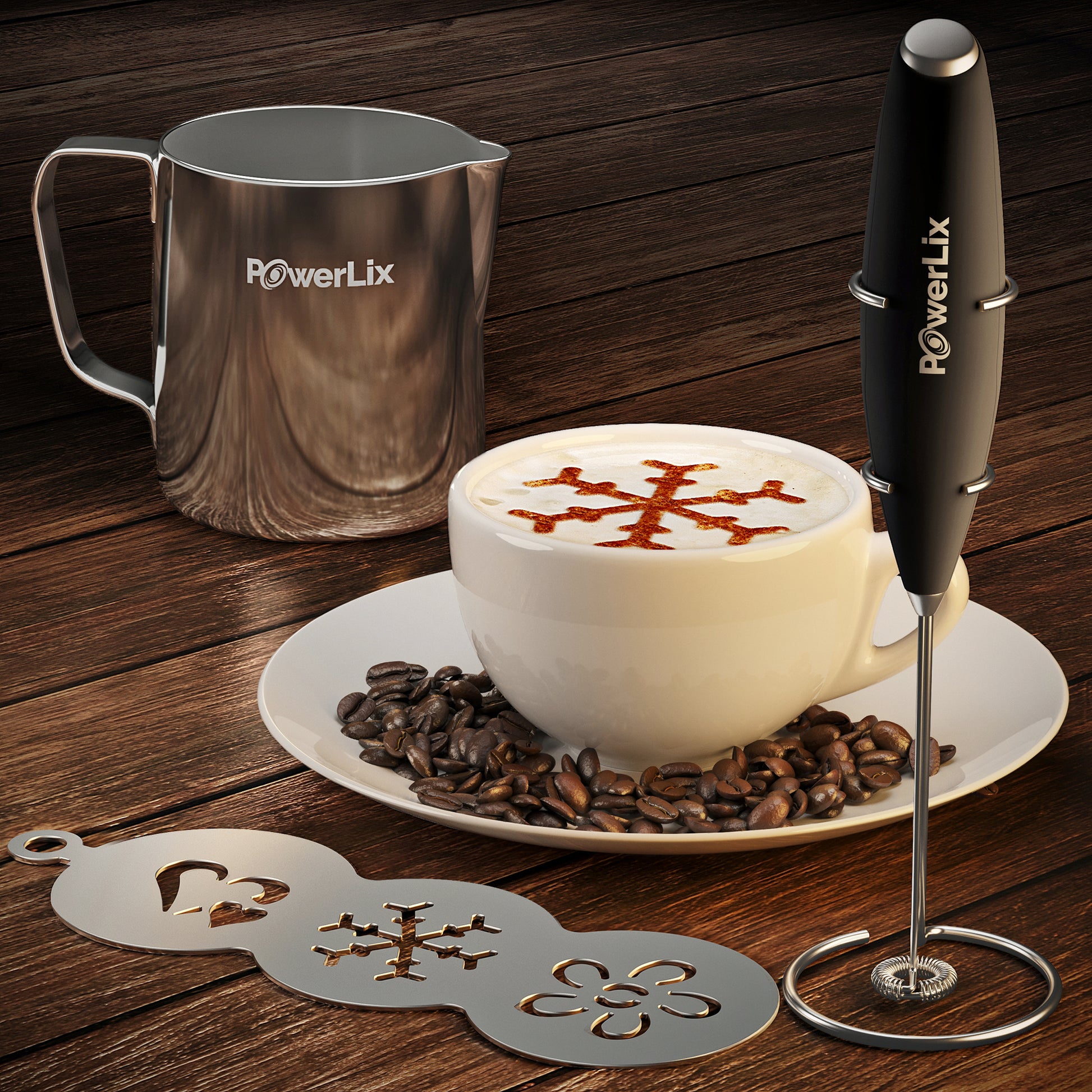 A cup of coffee on a saucer with milk foam and a snowflake stenciled on top with cocoa. The  stencil, milk pitcher, and milk frother on a stand are displayed.