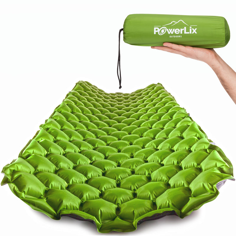 Green inflated sleeping pad, also show stored in the Powerlix Outdoors bag, held by a hand.