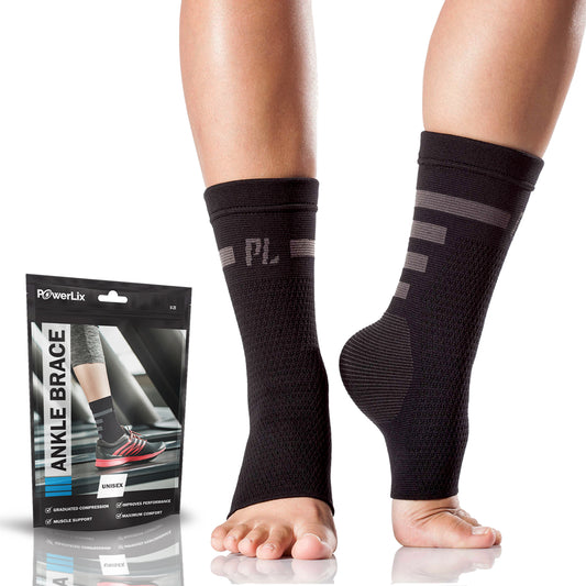 a pair of feet with black socks with text: 'PowerLix ANKLE BRACE UNISEX GRADUATED COMPRESSION IMPROVES PERFORMANCE MUSCLE SUPPORT MAXIMUM COMFORT'