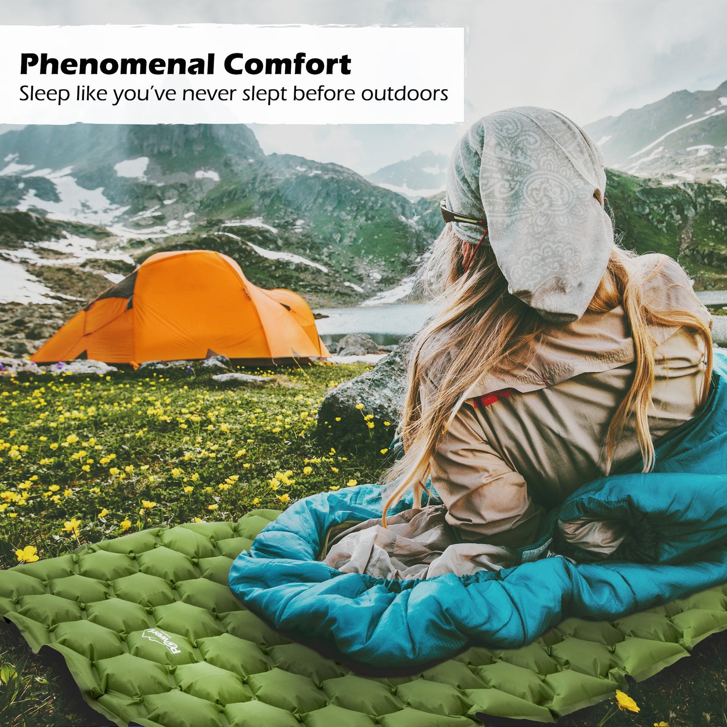 Model laying on a green, inflated Powerlix sleeping pad in the mountains. Tect reads, "Phenomenal Comfort. Sleep like you've never slept before outdoors."